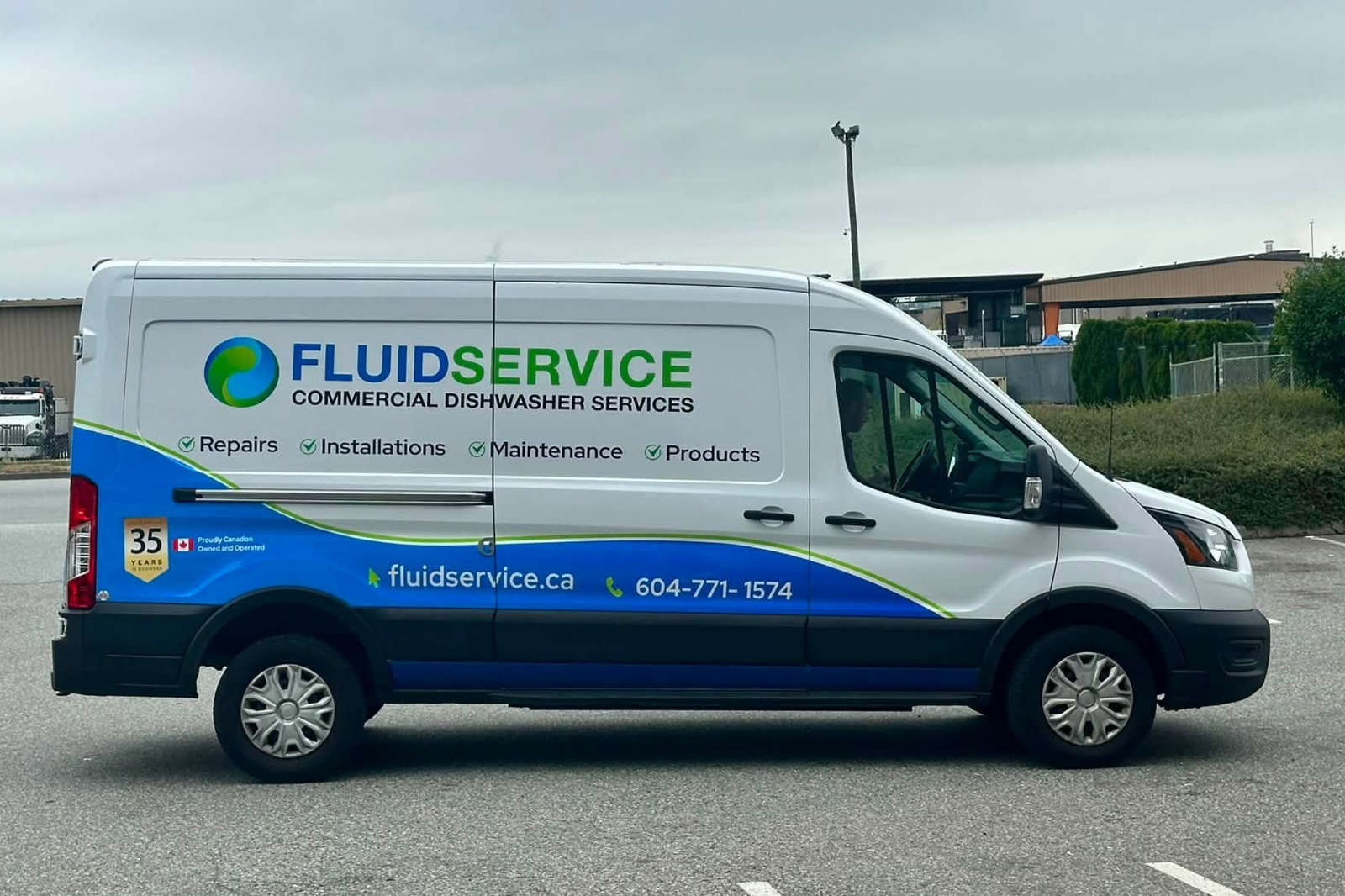 Fluid Service commercial dishwasher service van parked and ready for installation, maintenance, and repair calls in the Lower Mainland.